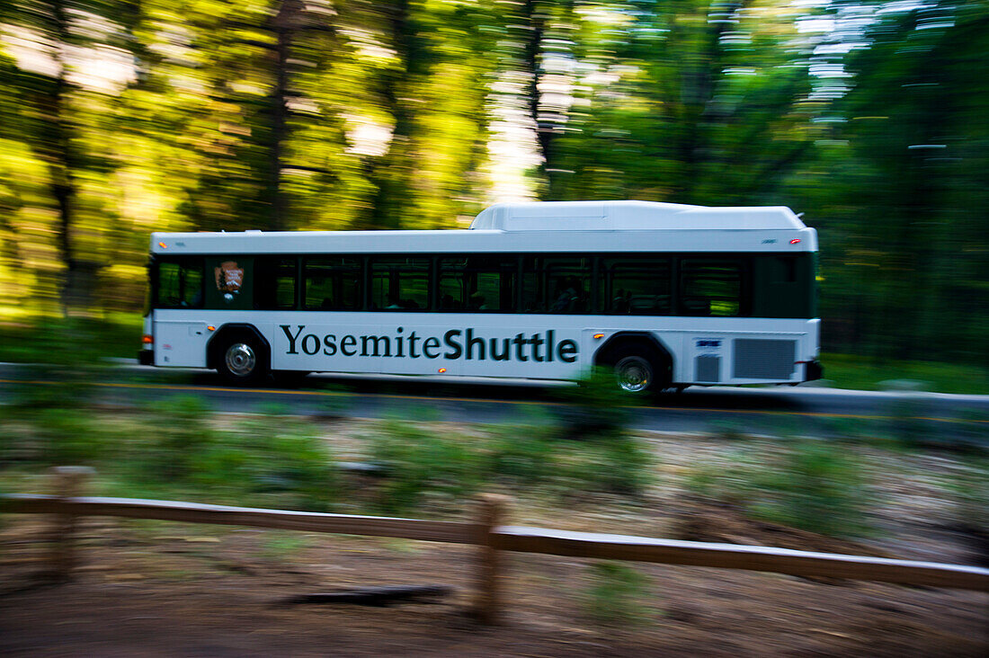 Hybrid diesel electric tourist bus in Yosemite National Park in Utah,USA,Utah,United States of America