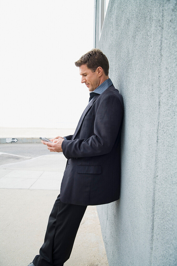 Businessman Using Cellular Phone