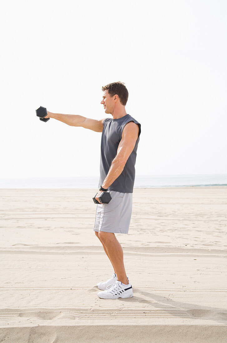 Man Exercising on Beach