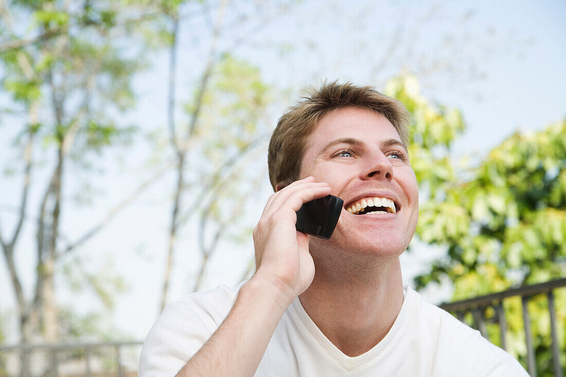 Man Using Cellular Phone