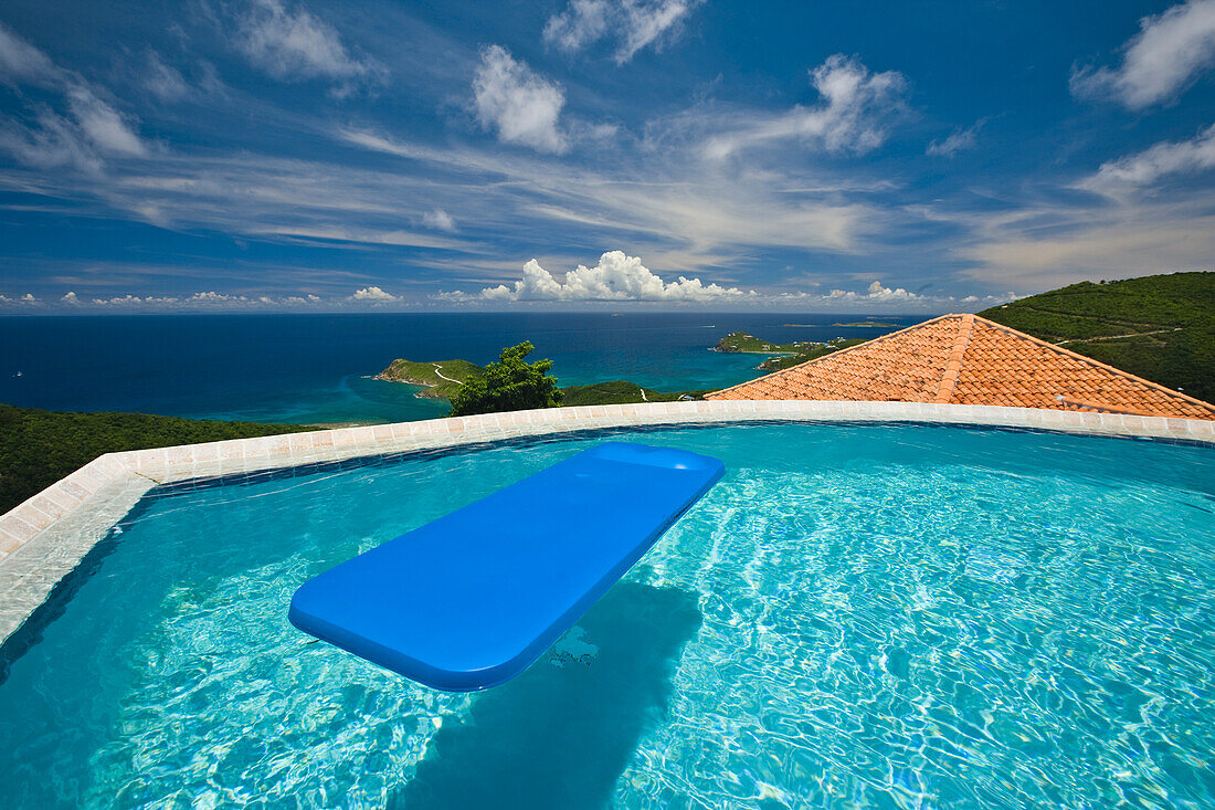 Blue raft floats in a pool overlooking the Caribbean Sea,Saint John,U.S. Virgin Islands