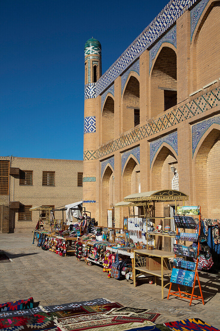 Goods for Sale and Islam Khoja Madrasah in Itchan Kala,UNESCO World Heritage Site,in Khiva,Uzbekistan,Khiva,Uzbekistan