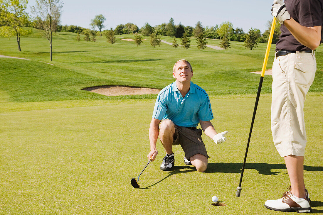 Men Playing Golf