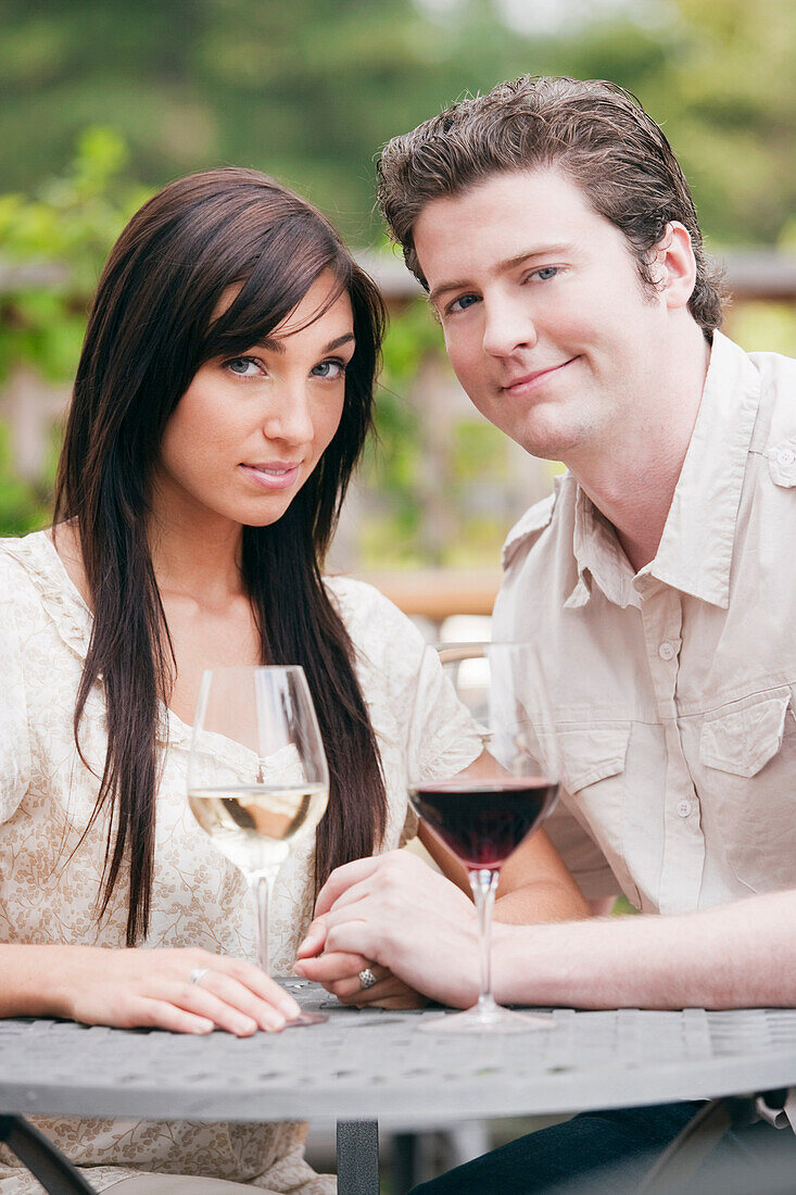 Couple Drinking Wine on Patio