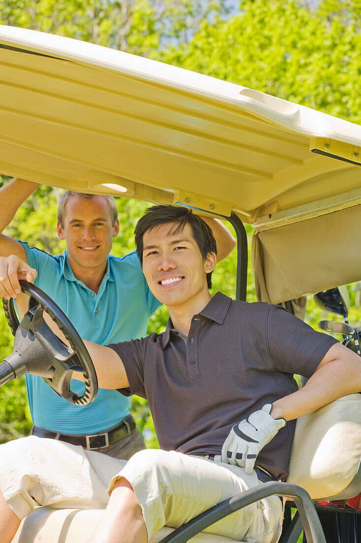 Men in Golf Cart