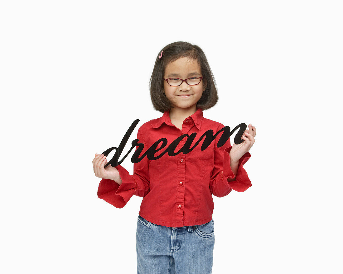 Girl Holding Dream Sign