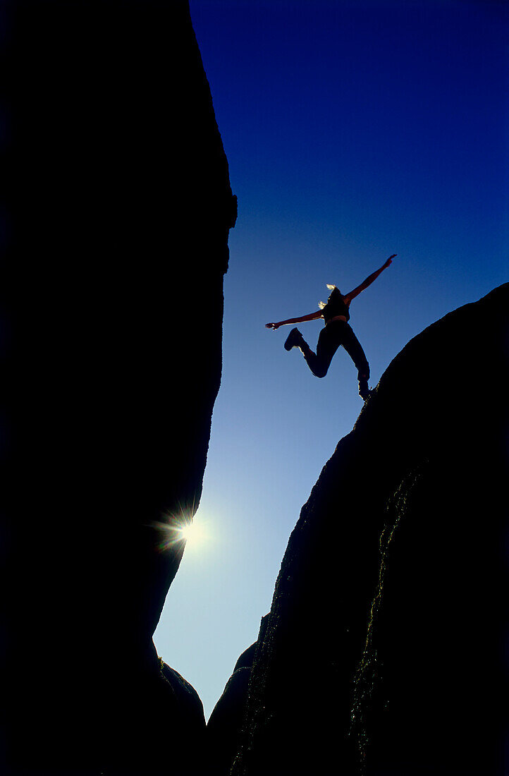 Silhouette of Person Jumping Gap Owens Valley,California,USA