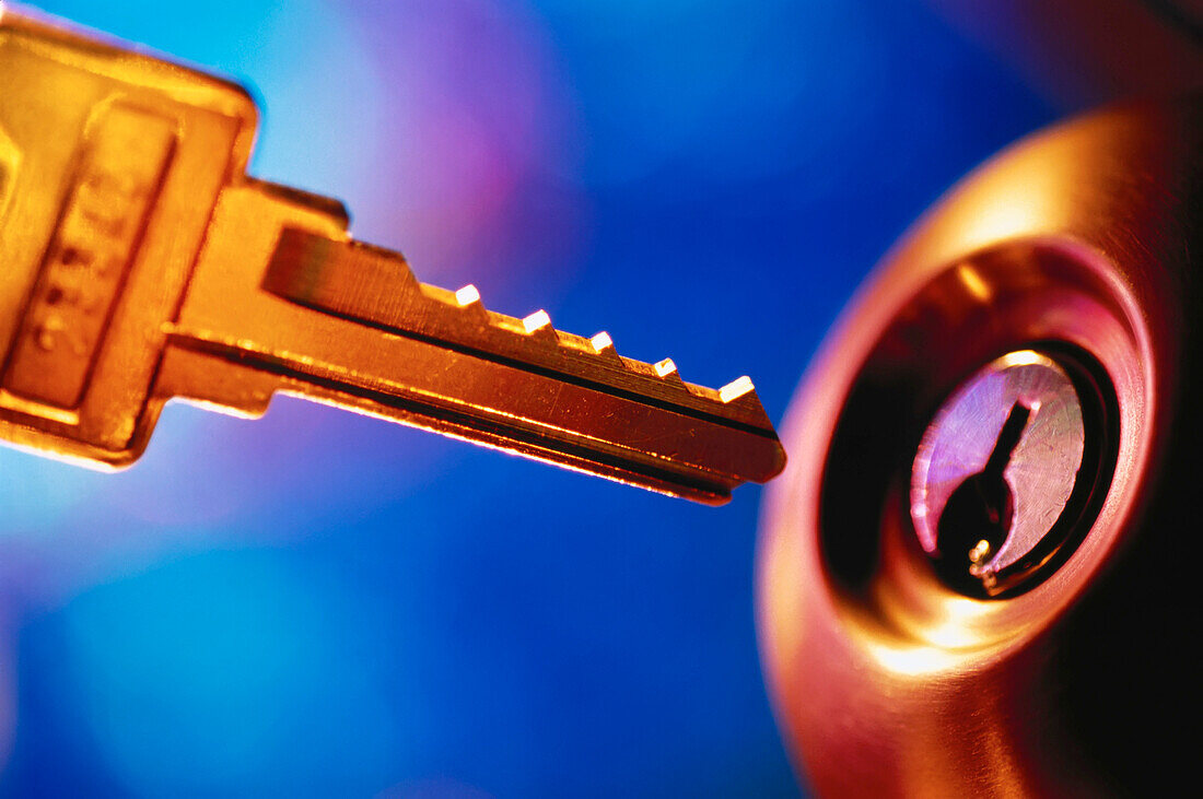 Close-Up of Key with Keyhole and Doorknob