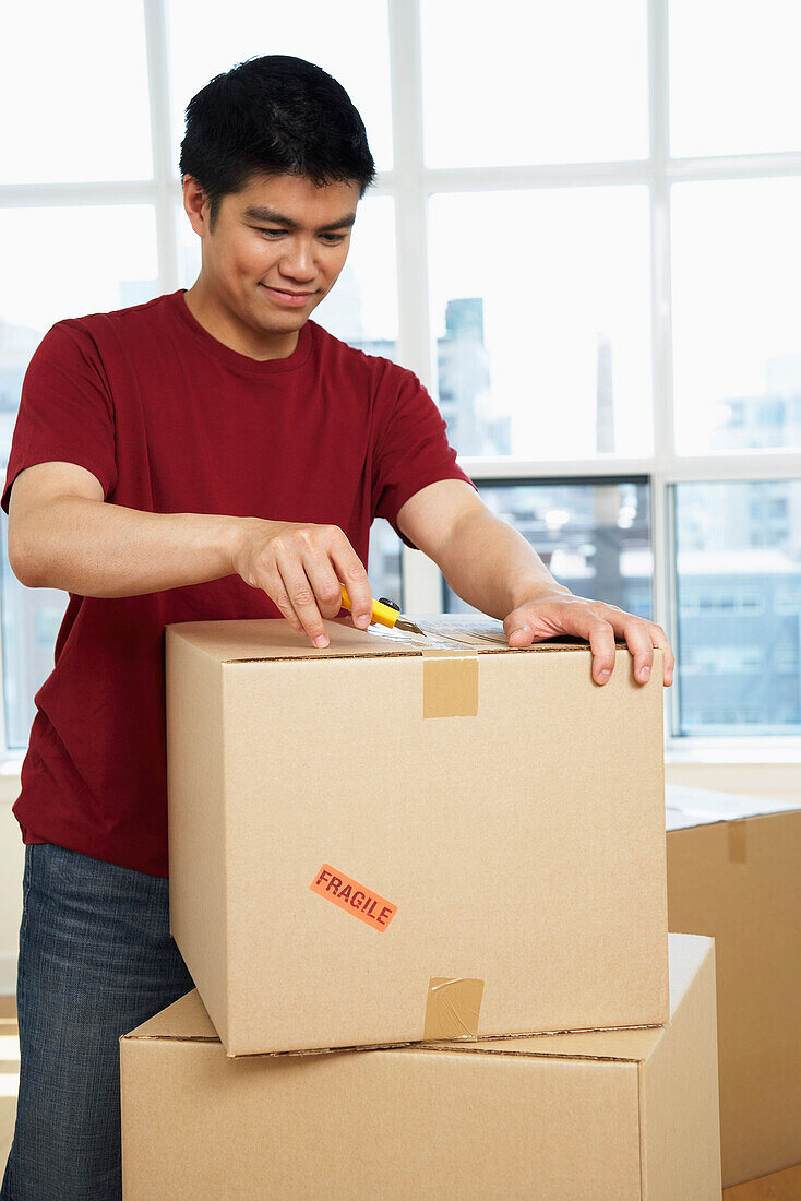 Man Packing Boxes