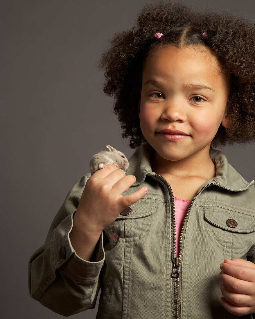 Girl Holding Hamster