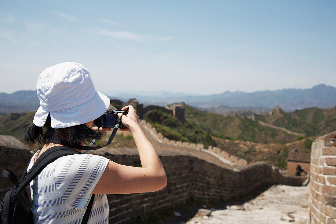 Tourist Taking Pictures of the Great Wall,China
