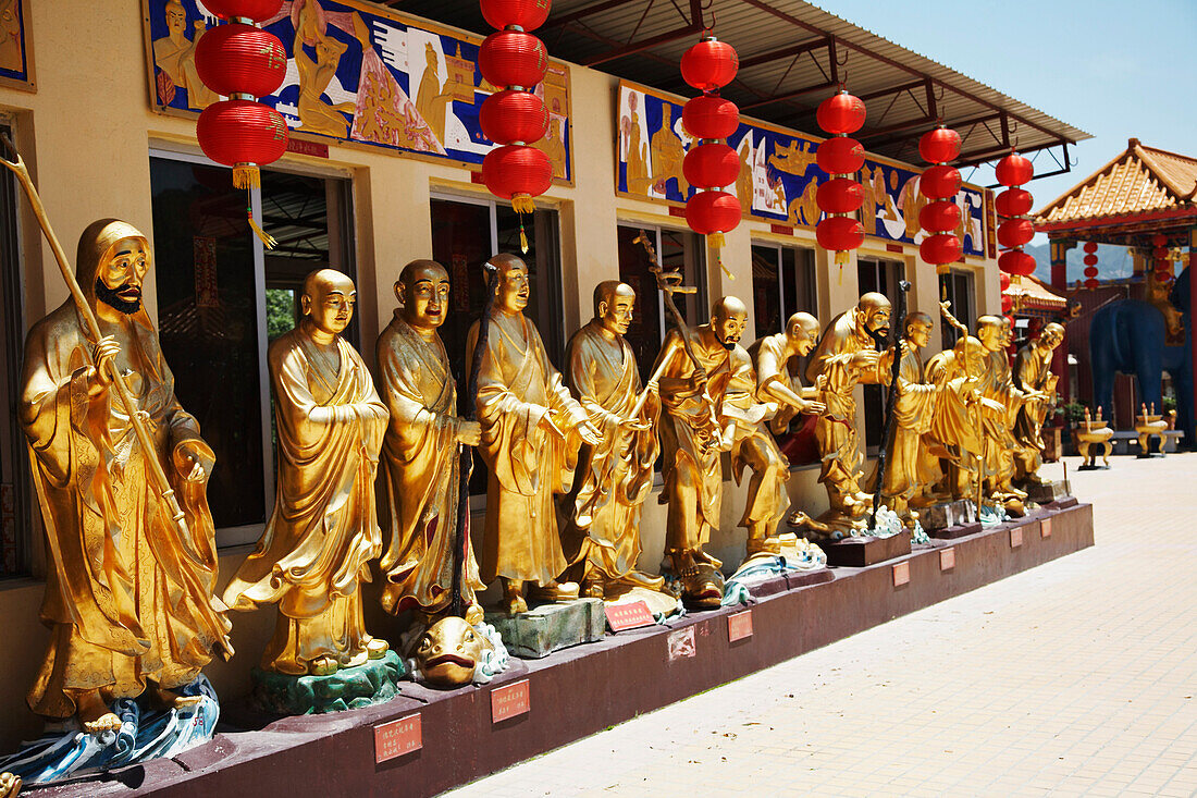 Path Lined With Golden Buddha Statues Leading to the Ten Thousand Buddhas Monastery,Sha Tin,New Territories,China