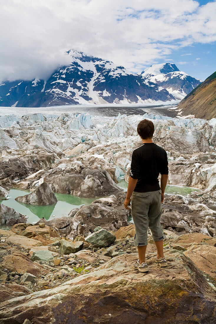 Teenager at Salmon Glacier,Coast Mountains,north of Stewart,British Columbia,Canada