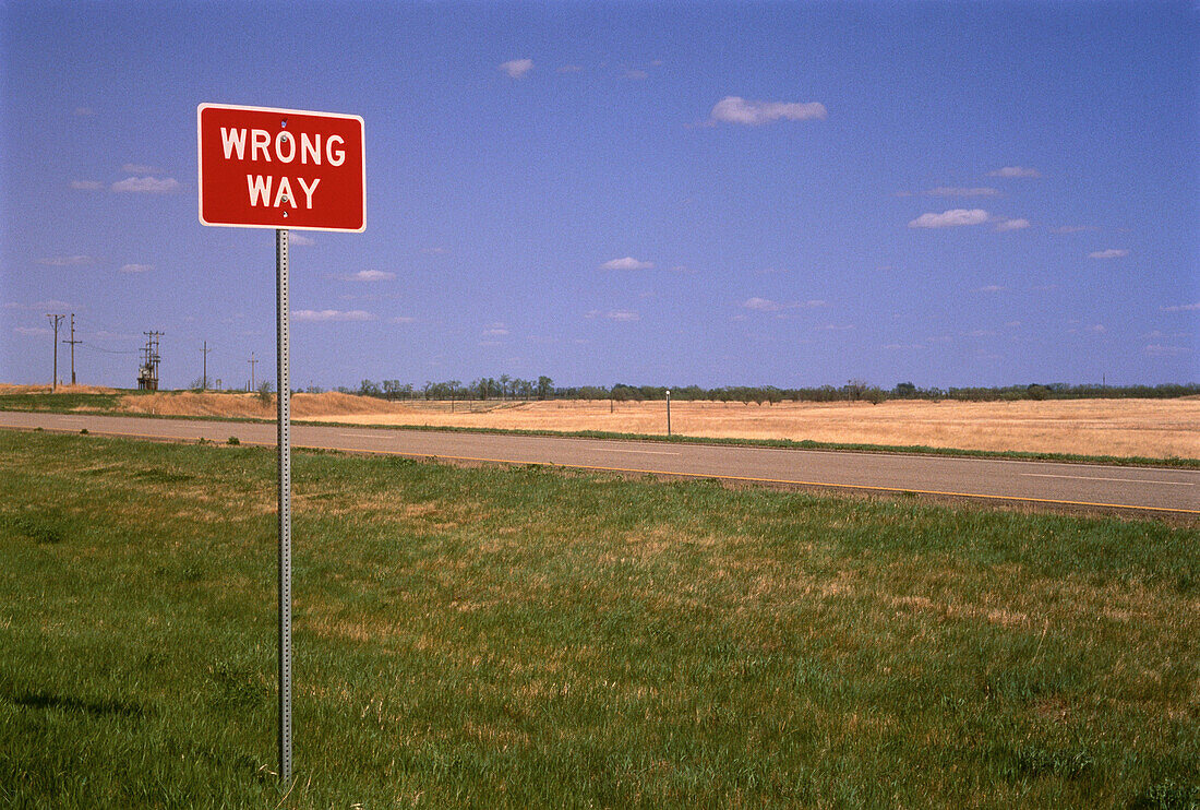 Wrong Way Sign near Road