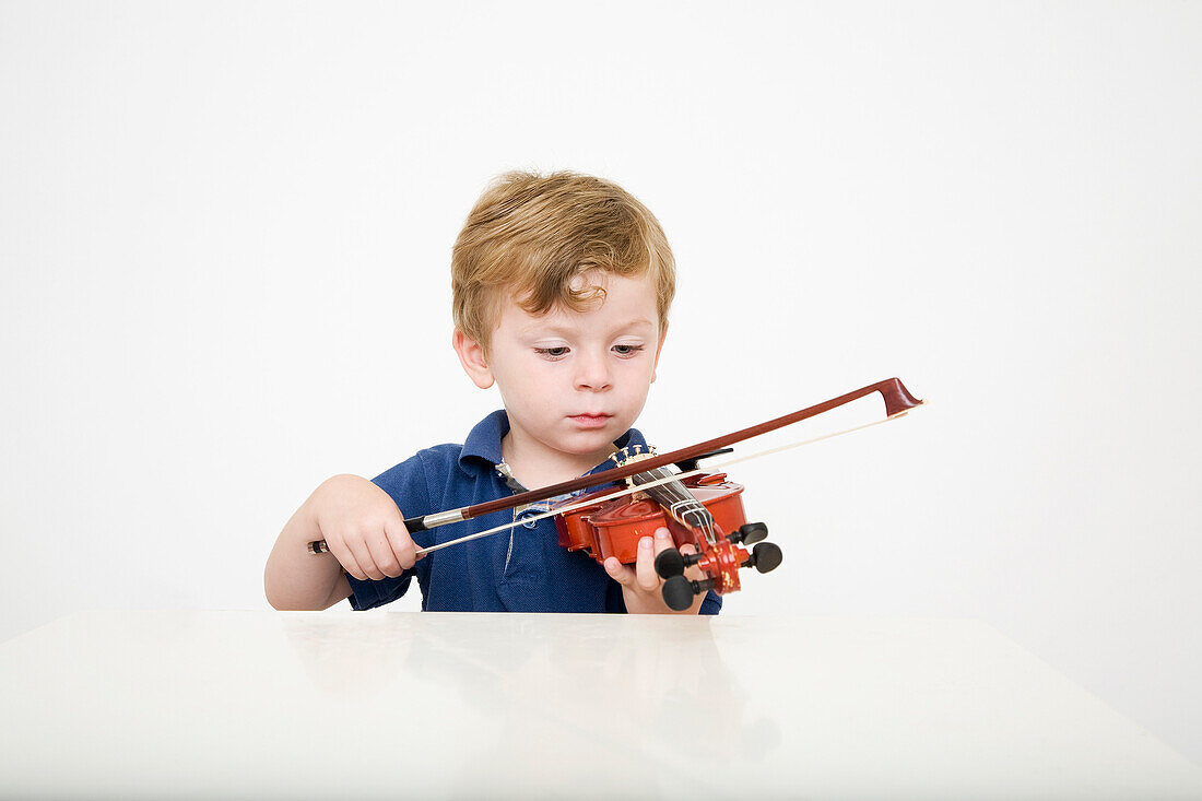 Young Boy Playing Violin