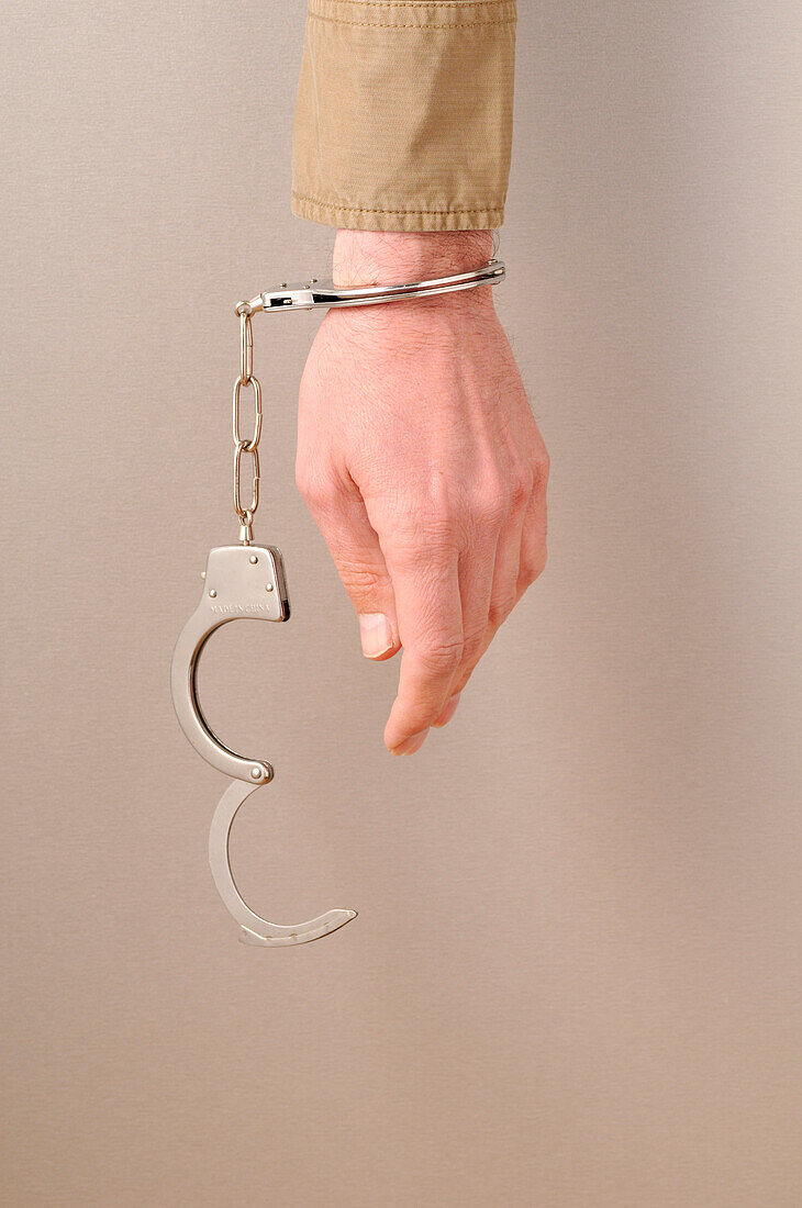 Handcuffs on Man's Wrist