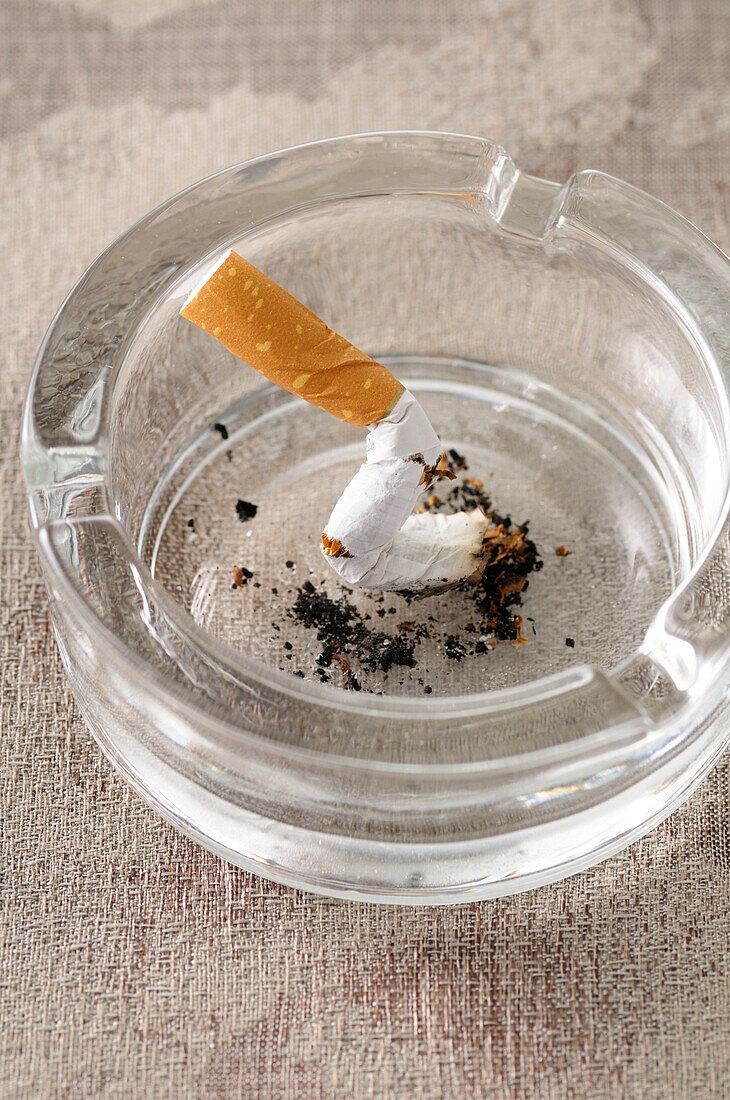 Close-up of Broken Cigarette in Ashtray