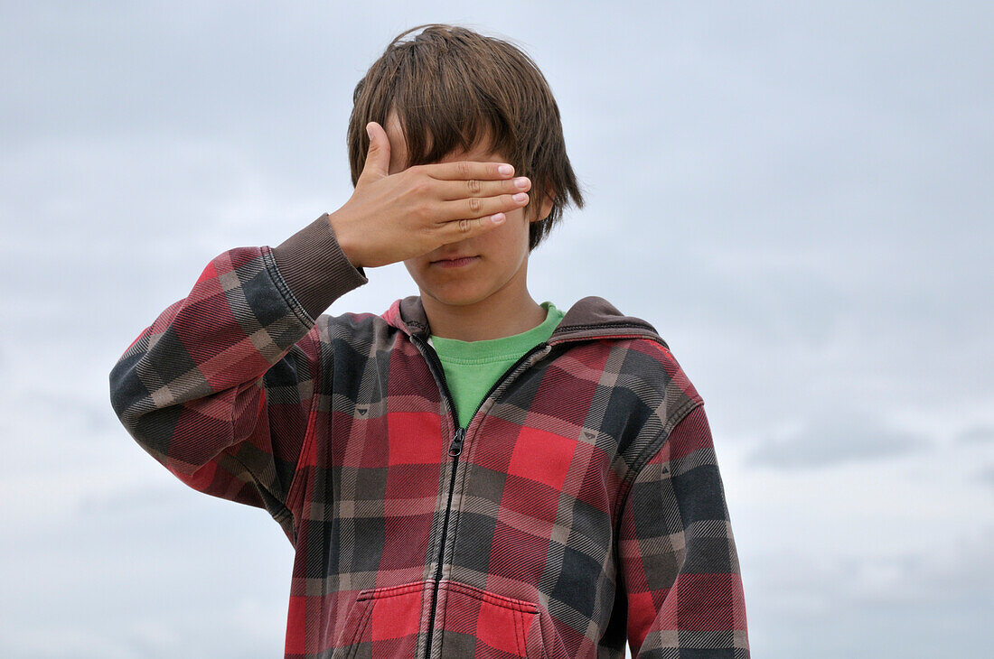 Portrait of Boy with Hand over Eyes,Ile de Re,France