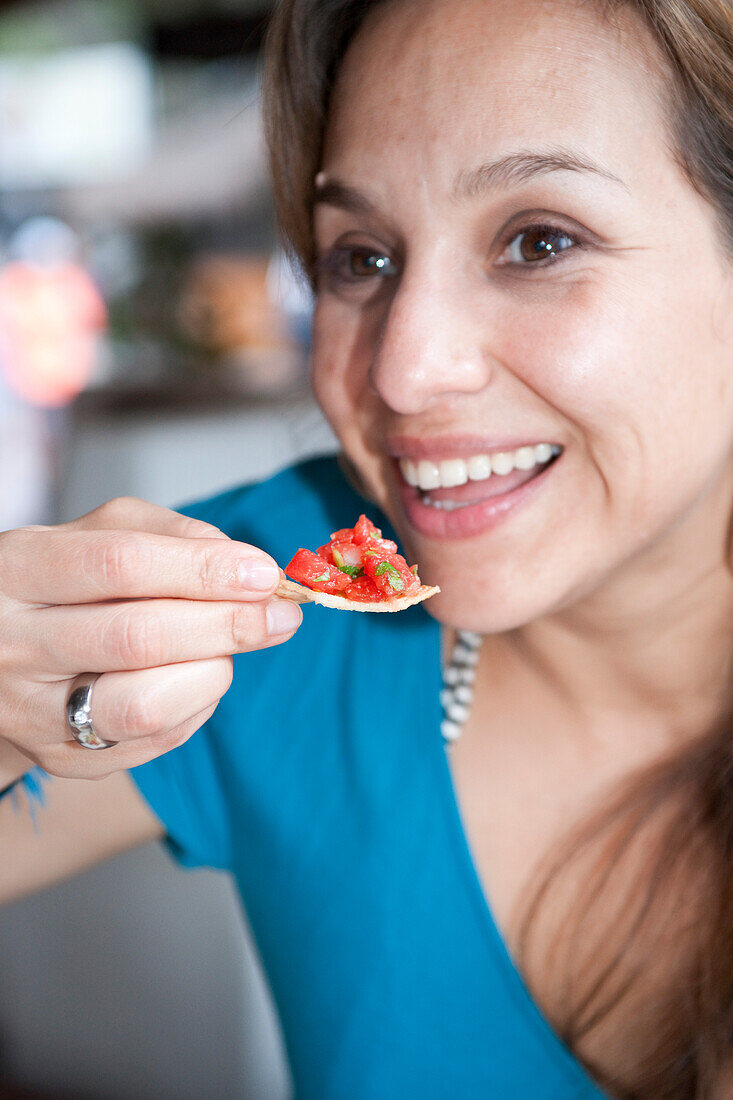 Woman Eating Nachos,Mexico