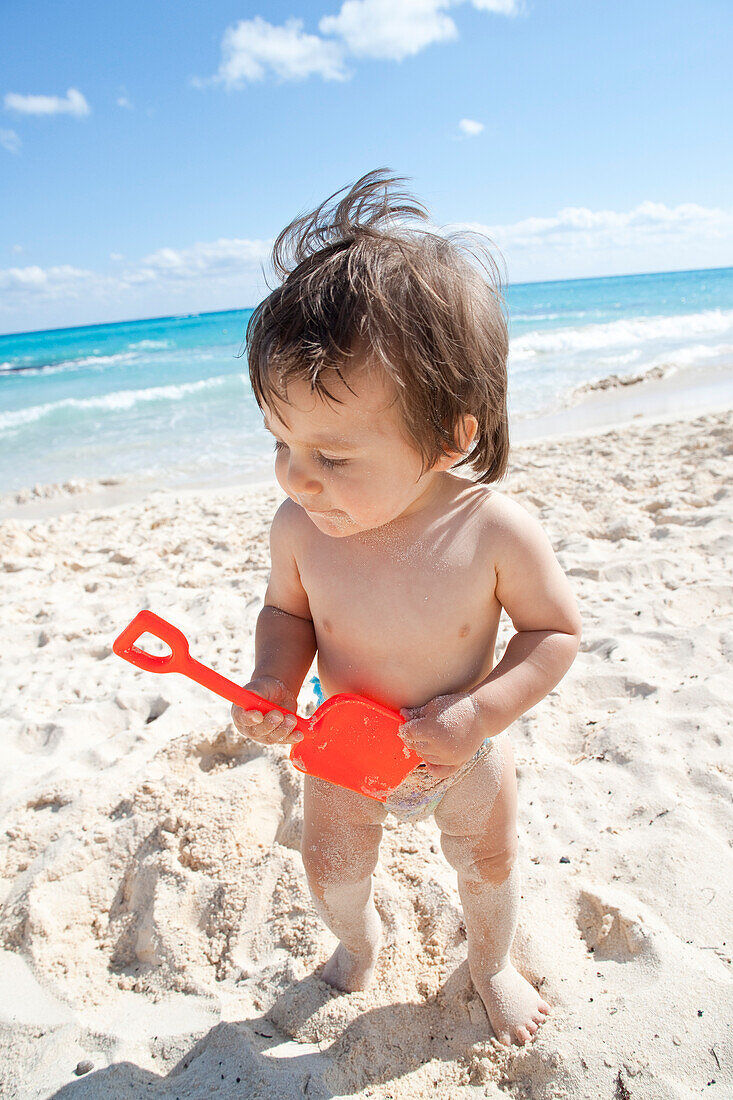 Baby Boy Playing in Sand,Playa del Carmen,Yucatan Peninsula,Mexico