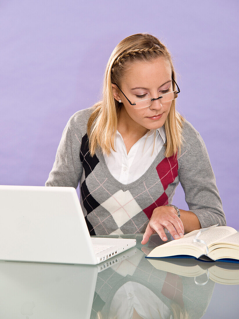 Young Woman Using Laptop Computer