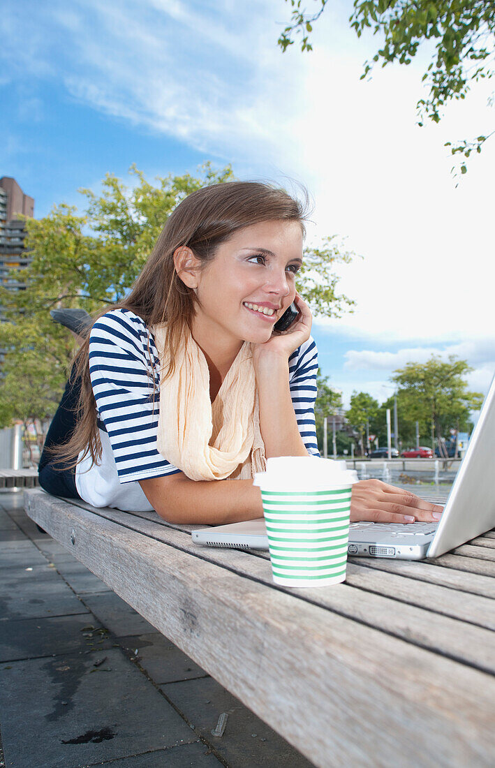 Young Woman Using Laptop Computer