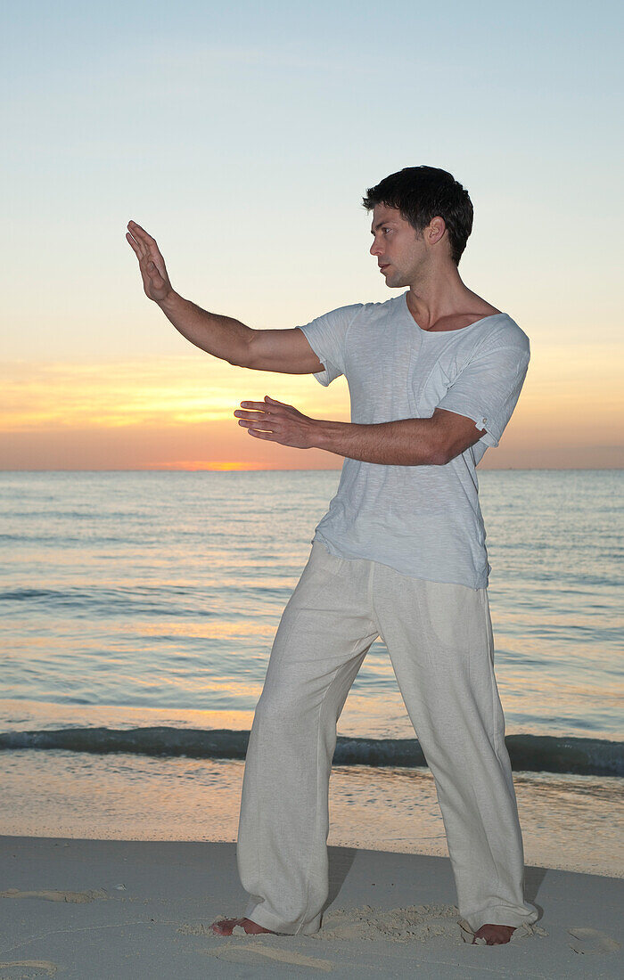 Man Practicing Tai Chi,Reef Playacar Resort and Spa Hotel,Playa del Carmen,Quintana Roo,Yucatan Peninsula,Mexico