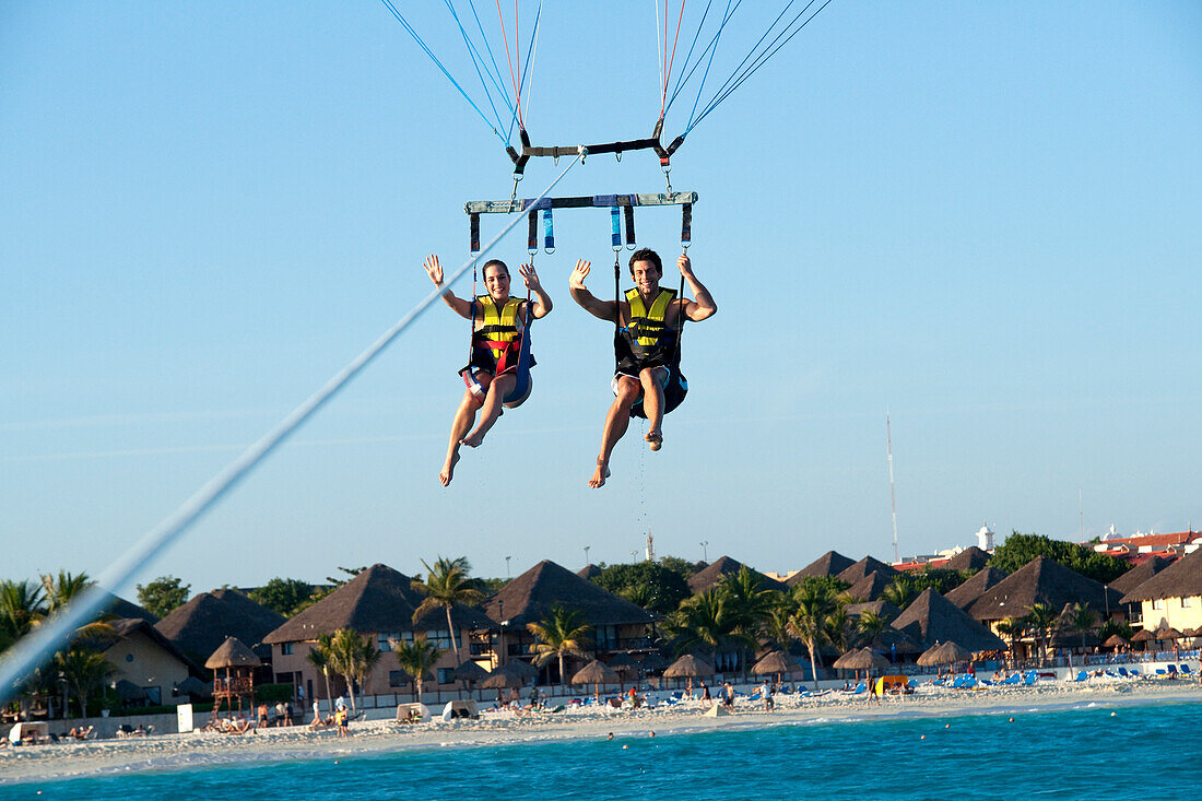 Couple Paragliding,Reef Playacar Resort and Spa Hotel,Playa del Carmen,Quintana Roo,Yucatan Peninsula,Mexico