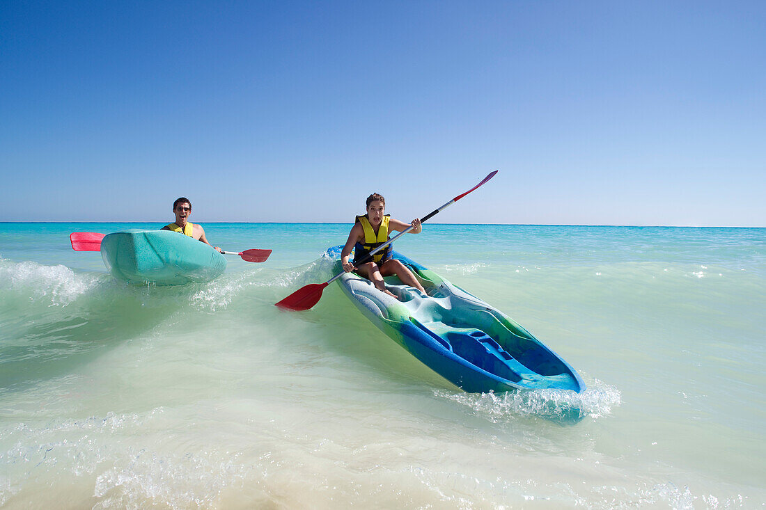 Couple Kayaking,Reef Playacar Resort and Spa,Playa del Carmen,Mexico