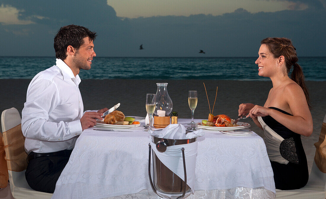 Couple Dining on Beach,Reef Playacar Resort and Spa,Playa del Carmen,Mexico