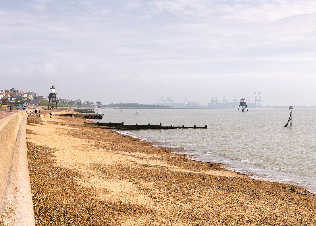 View towards Dovercourt High and Low Lighthouses (Dovercourt Range Lights),built in 1863 to work as leading lights,guiding vessels around Landguard Point,and discontinued in 1917,Harwich,Essex,England,United Kingdom,Europe