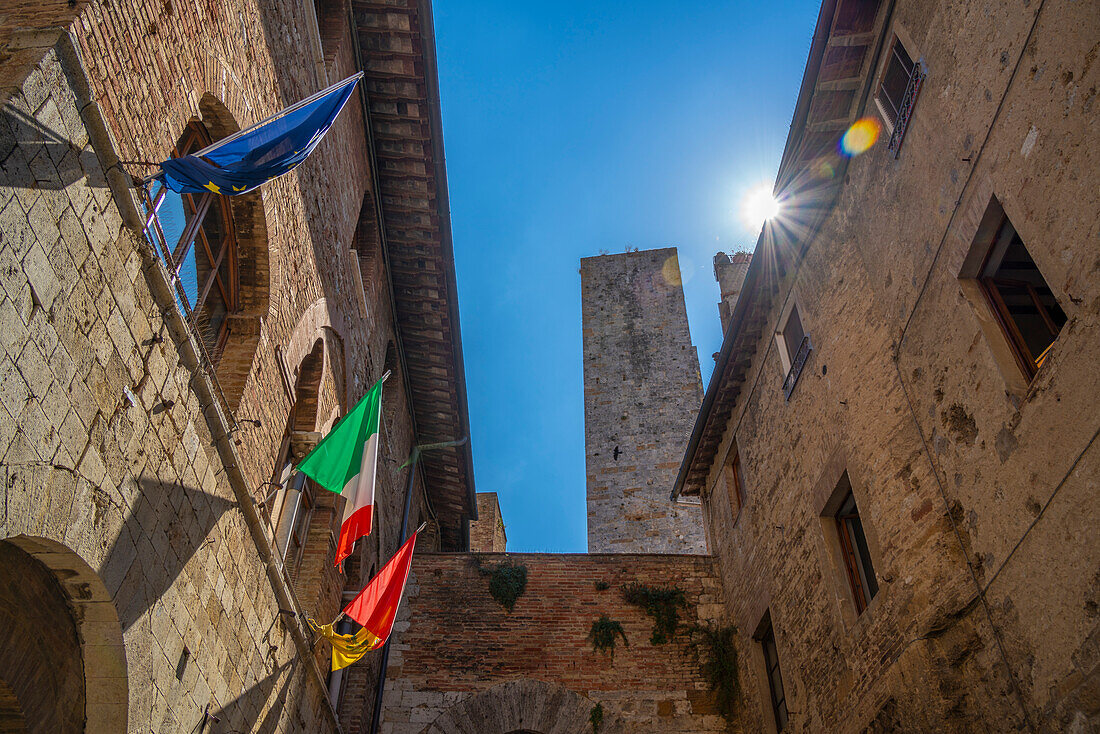 View of towers from narrow street in San Gimignano,San Gimignano,UNESCO World Heritage Site,Province of Siena,Tuscany,Italy,Europe
