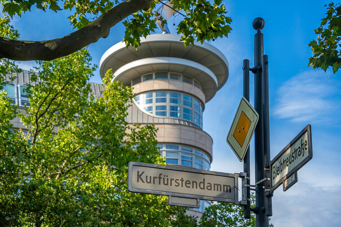 View of sign and building on the tree lined Kurfurstendam in Berlin,Germany,Europe