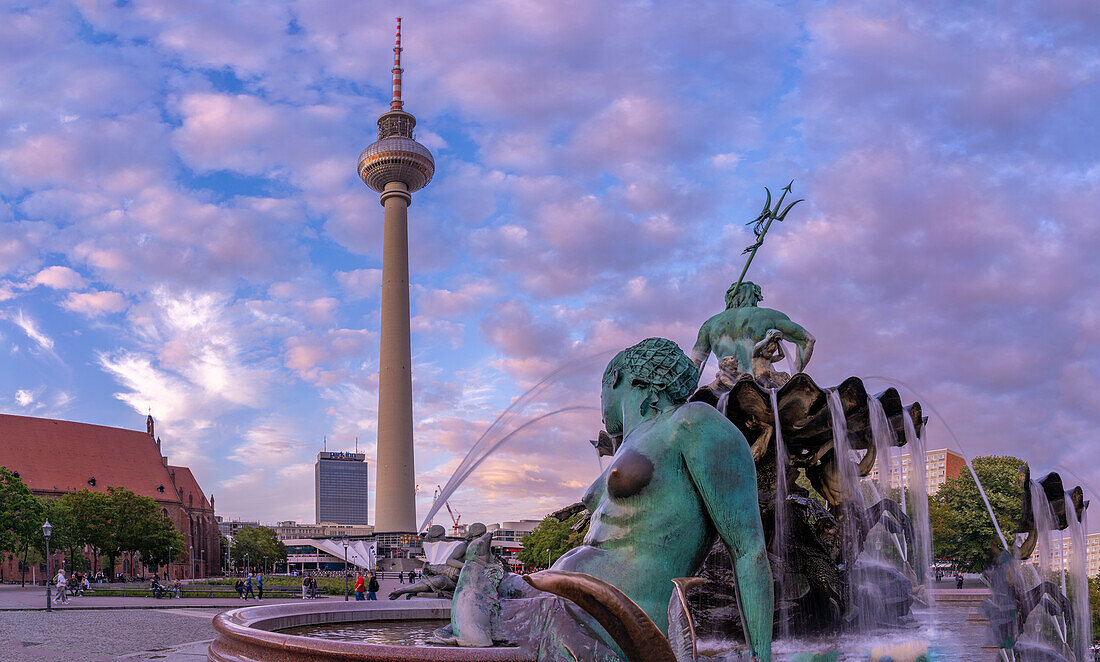 View of Berliner Fernsehturm and Neptunbrunnen fountain at dusk,Panoramastrasse,Berlin,Germany,Europe