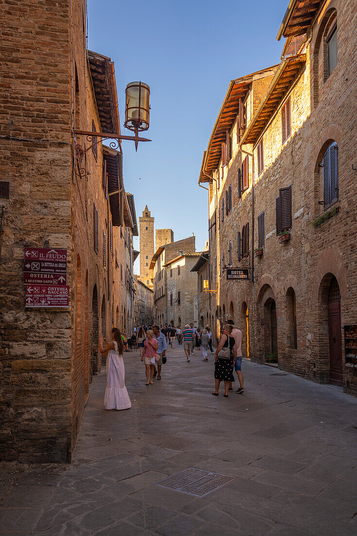 View of narrow street in San Gimignano,San Gimignano,Province of Siena,Tuscany,Italy,Europe