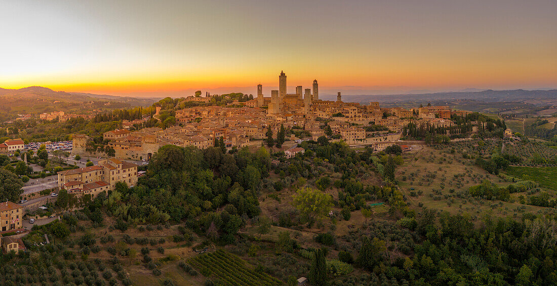 Elevated view of San Gimignano and towers at sunset,San Gimignano,Tuscany,Italy,Europe