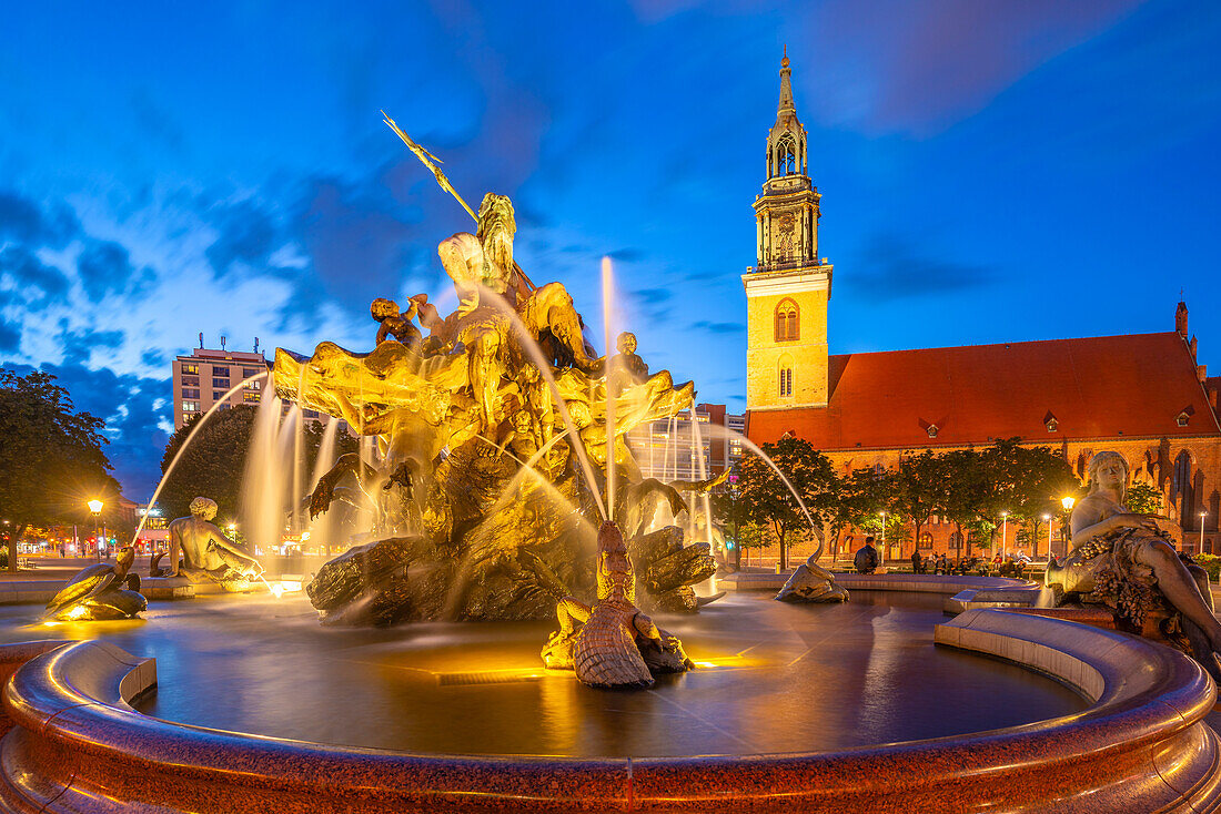 View of St. Mary's Church and Neptunbrunnen fountain at dusk,Panoramastrasse,Berlin,Germany,Europe