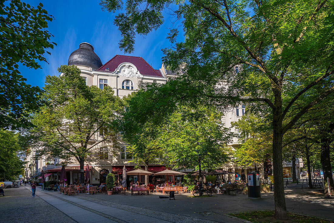 View of restaurant on the tree lined Kurfurstendam in Berlin,Germany,Europe