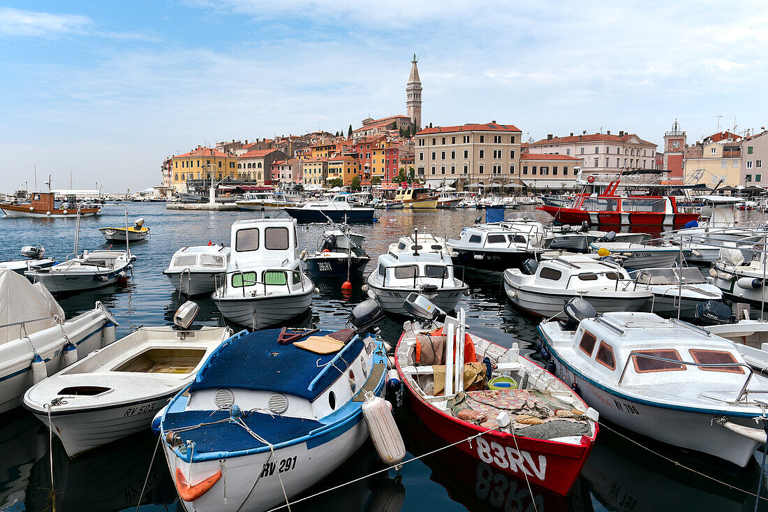 Boats in the harbor overlooking the old town of Rovinj,Croatia,Europe