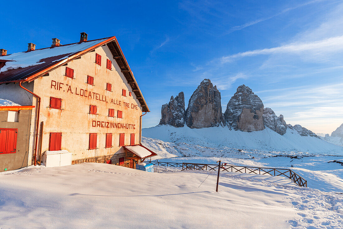 Locatelli mountain hut and Tre Cime di Lavaredo (Lavaredo Peaks)(Drei Zinnen) in the winter covered with thick snow,Tre Cime di Lavaredo,Sesto (Sexten),Dolomites,South Tyrol,Italy,Europe