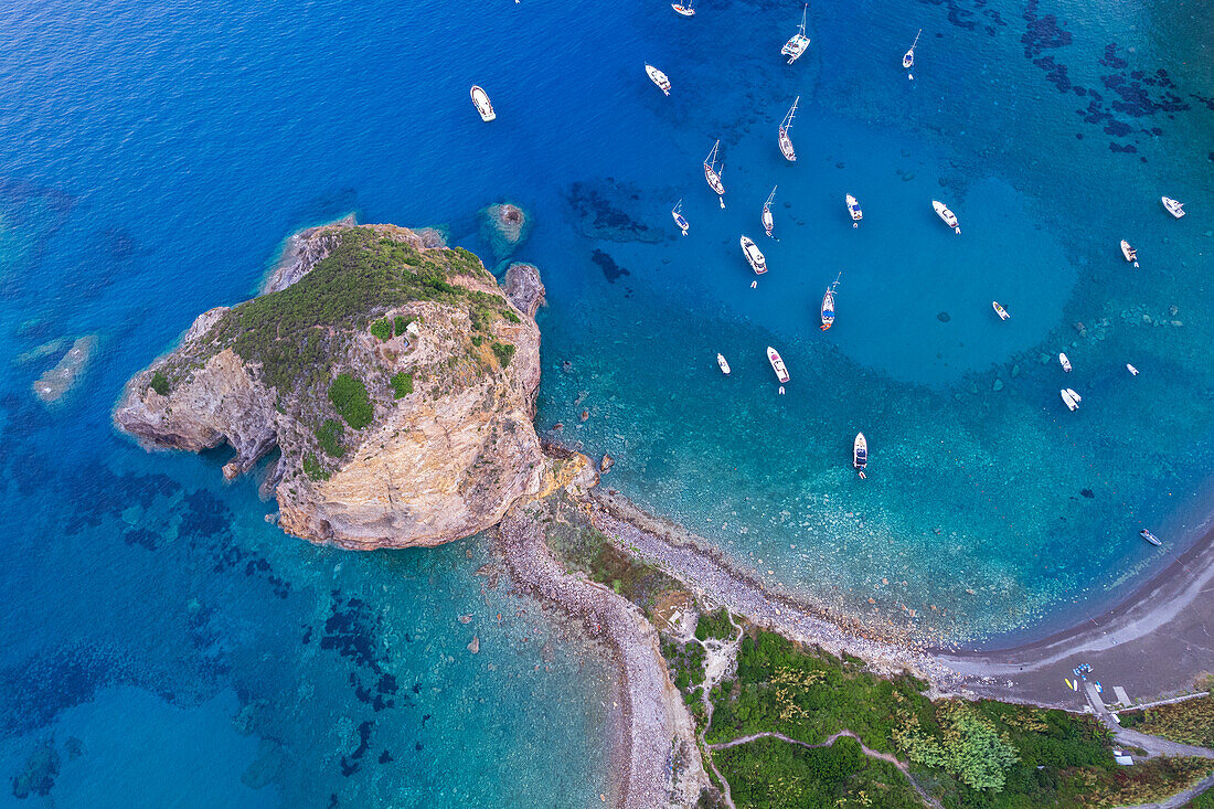 Aerial view of the cliff of Saint Silverio with boats anchored in Francese Bay,Palmarola island,Ponza municipality,Tyrrhenian Sea,Pontine archipelago,Latina Province,Latium (Lazio),Italy,Europe