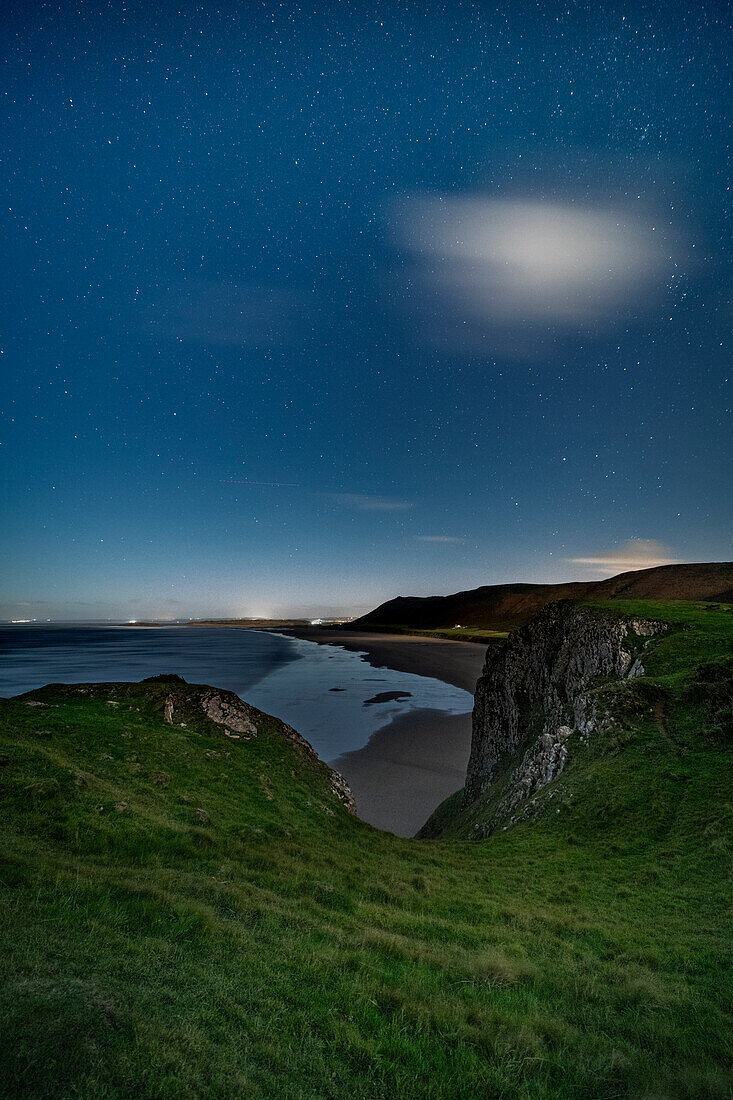 Worms Head and Rhossili beach under moonlight,Gower,South Wales,United Kingdom,Europe