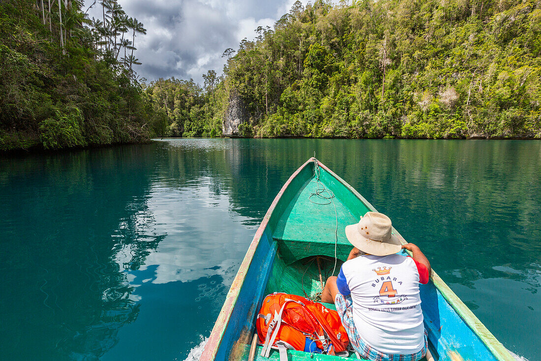 A small canoe trip with local guide Martin Marcuse,Gam Island,Raja Ampat,Indonesia,Southeast Asia,Asia