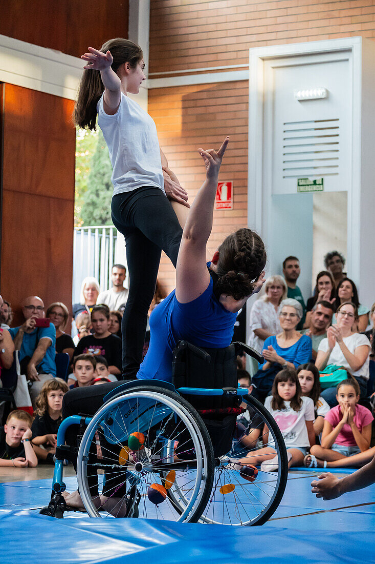 Circus show with kids at Centro Civico La Almozara during the Fiestas of el Pilar,Zaragoza,Aragon,Spain