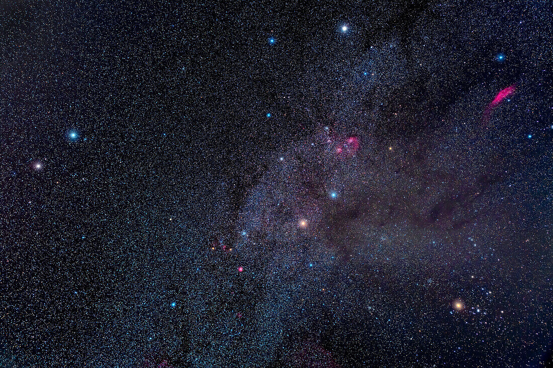 A framing of the northern winter sky constellations of Gemini (left),Auriga (top) and Taurus (bottom right). The Messier star clusters M35 in Gemini,and the trio of M36,M37 and M38 in Auriga show up well. The large nebula at upper right is NGC 1499,the California Nebula in Perseus. The Flaming Star,IC 405,and other IC nebulas in Auriga are right of centre. The small round nebula at bottom is IC 2174 in northern Orion. The dark lanes of the Taurus Dark Molecular Clouds are right of centre. Mars is just below centre in Taurus,adding an extra star to this already rich area of sky and matching Ald