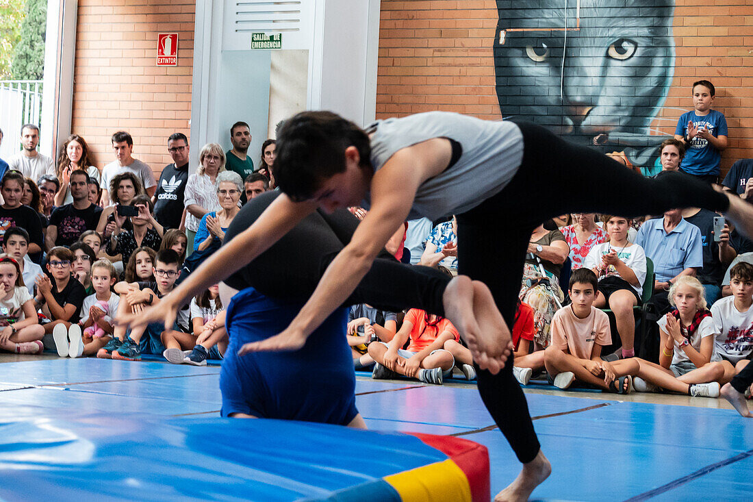 Circus show with kids at Centro Civico La Almozara during the Fiestas of el Pilar,Zaragoza,Aragon,Spain