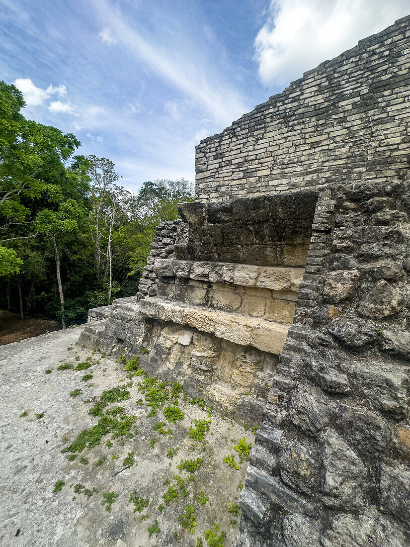 Detail of talud-tablero architectural style in the Mayan ruins of Yaxha-Nakun-Naranjo National Park,Peten,Guatemala. Structure 1 of the Maler Group or Plaza of the Shadows.