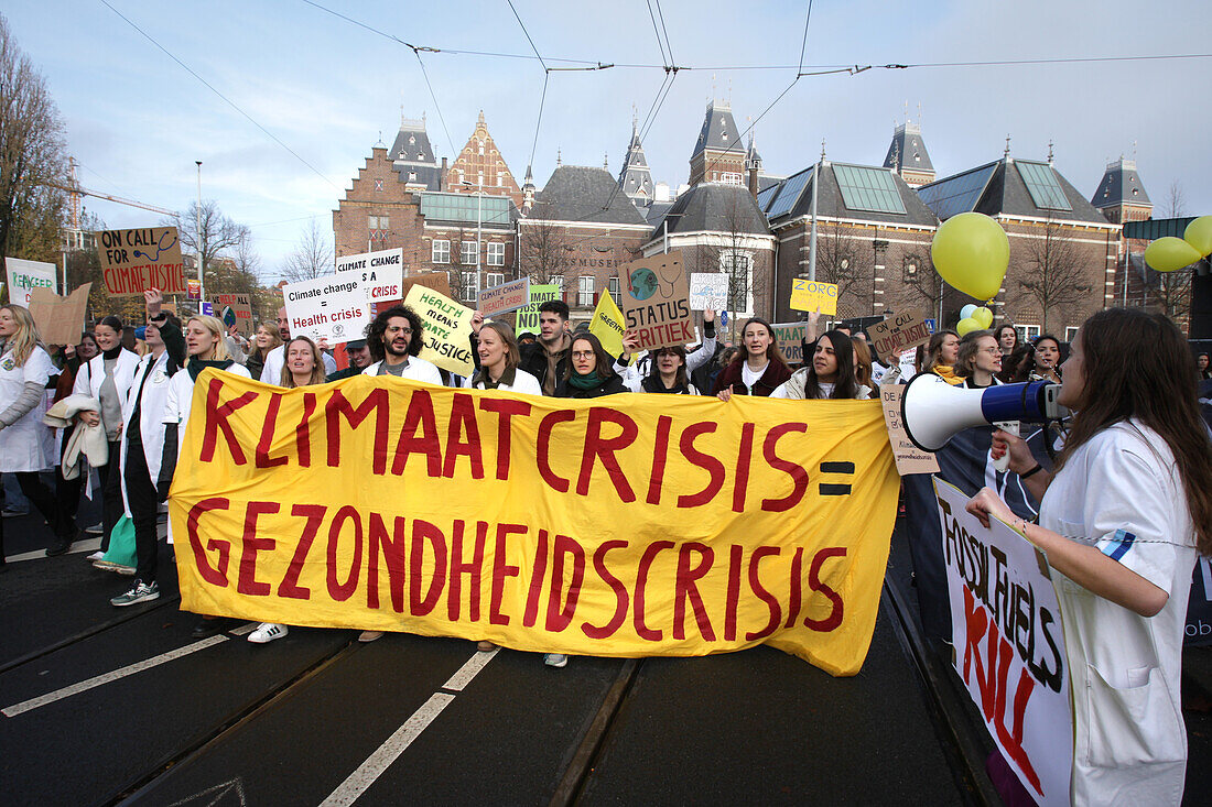 Environmental activists and supporters attend the March For Climate And Justice on November 12,2023 in Amsterdam,Netherlands. Protestors demand action from the Dutch government and world leaders to combat the climate change crisis,heat records are being broken again and again,resulting in profound changes for all life on Earth. An estimated 70,000 people have walked on Sunday with the climate march in Amsterdam,according to the Amsterdam municipality.