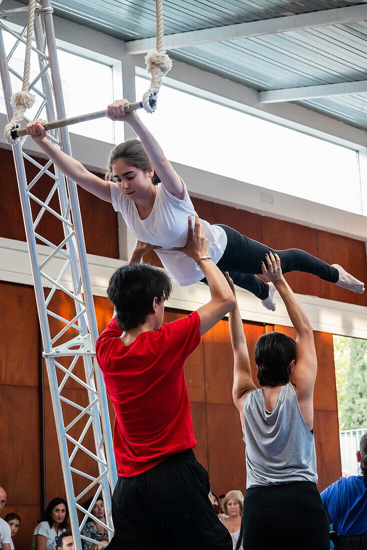 Circus show with kids at Centro Civico La Almozara during the Fiestas of el Pilar,Zaragoza,Aragon,Spain