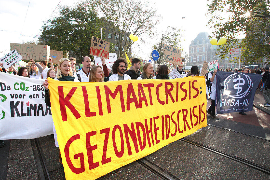 Environmental activists and supporters attend the March For Climate And Justice on November 12,2023 in Amsterdam,Netherlands. Protestors demand action from the Dutch government and world leaders to combat the climate change crisis,heat records are being broken again and again,resulting in profound changes for all life on Earth. An estimated 70,000 people have walked on Sunday with the climate march in Amsterdam,according to the Amsterdam municipality.